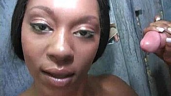 Black chick gives gloryhole blowjob 12