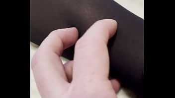 Boy rubs my feet in my new stockings