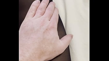 Boy rubs my feet in my new stockings