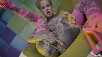 Heavily tattooed teen wrecking her hole with an anal stretch session