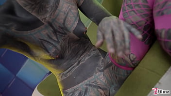 Heavily tattooed teen wrecking her hole with an anal stretch session