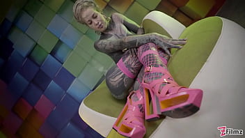 Heavily tattooed teen wrecking her hole with an anal stretch session