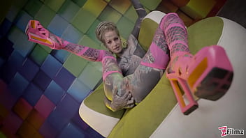 Heavily tattooed teen wrecking her hole with an anal stretch session