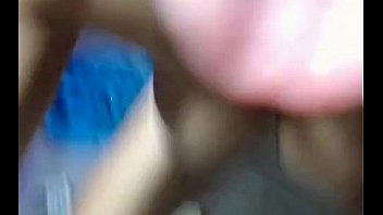 Busty milf brunette puts a dildo in her ass