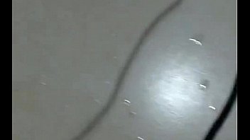 Busty milf brunette puts a dildo in her ass