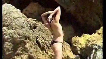 Exotic girl on the rocks