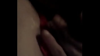 Playing with her wet pussy