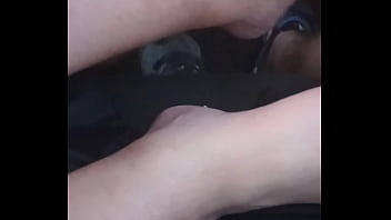 She plays with my dick with feet