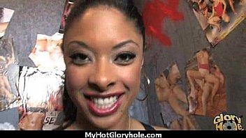Ebony hottie milking cocks in the gloryhole 10