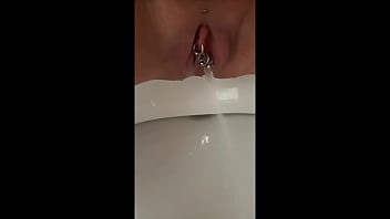 Close up view on my pissing pussy and pierced clit