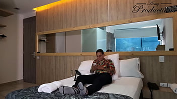 The cleaning girl helps him with his new toy by sucking him