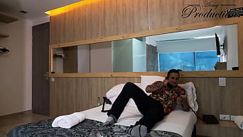 The cleaning girl helps him with his new toy by sucking him