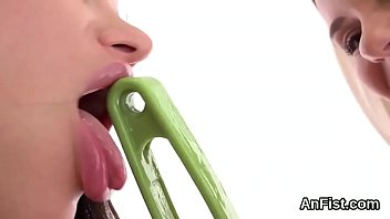 Lesbian girl gets her shaved slit and butthole fist fucked