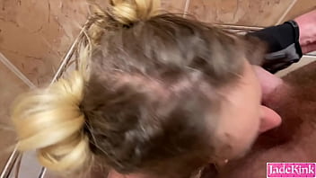 Handcuffed slut get facial in shower