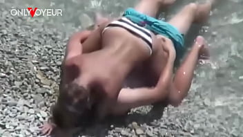 Beach voyeur amateur couple quick fuck in ocean waves on a public beach Beach voyeur amateur couple quick fuck in ocean waves on a public beach