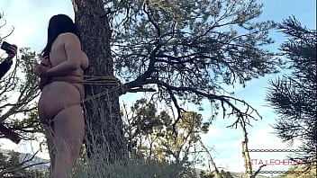 Tied and spanked in the forest