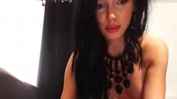 Sexy brunette babe rubs clit on webcam