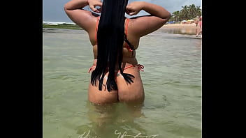Brazilian married brunette girl in bikini micro on the beach filmed by her husband