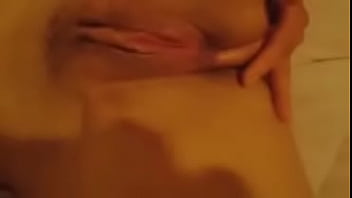 Finger woman on her home