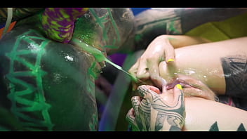 Tattooed girl gets her ass filled with cum compliments of punk girls