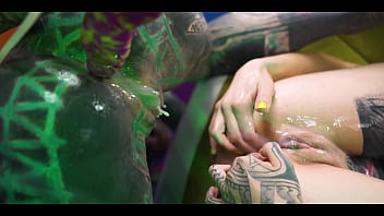 Tattooed girl gets her ass filled with cum compliments of punk girls