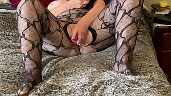 Mature masturbates with a timer ticking away