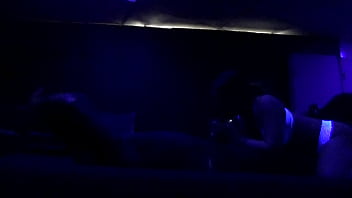 Woman fucks under black light