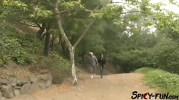 Brunette blowing her boyfriend by the road