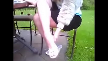 Jessica sitting outside showing off her sexy legs and dangling her shoes from her perfect feet Jessica sitting outside showing off her sexy legs and dangling her shoes from her perfect feet