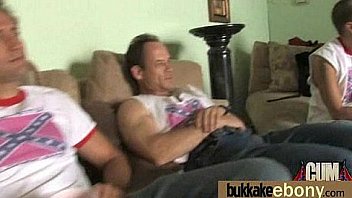 Huge cocks cover their black face in cum 4