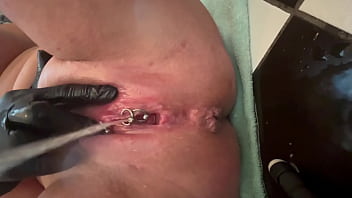 Pee very strong stream from my pierced pussy and my hands in latex glove