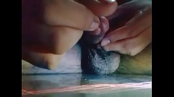 Insert stick in penis and getting wet