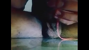 Insert stick in penis and getting wet