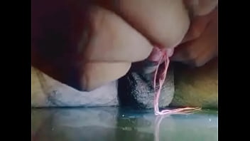 Insert stick in penis and getting wet