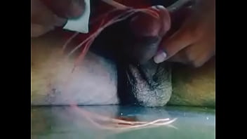 Insert stick in penis and getting wet