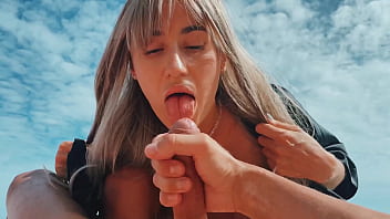 A blonde girl strokes a guys dick with feet masturbates he cums public nudist beach foot fetish