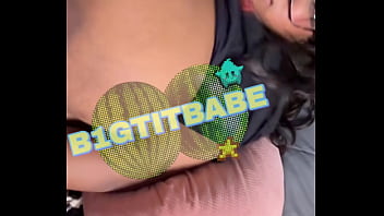 Giant tits playing on floor with toy