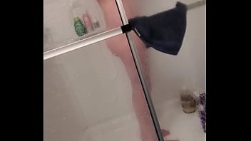 Redhead nice tits in the shower