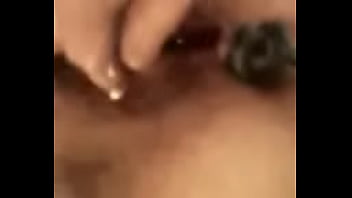 Leona playing with blue toy