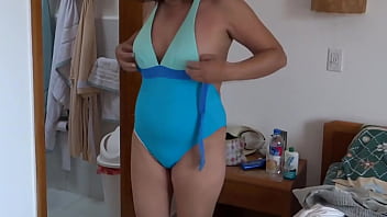 On The Beach I Masturbate Watching As Stepmom Puts On A Bikini To Go In Search Of A Man thumbnail