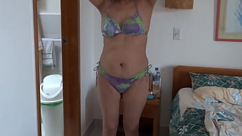 On the beach i masturbate watching as stepmom puts on a bikini to go in search of a man