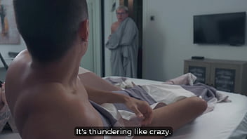 Step mom seduces step son in stormy bed share—husband watches creampie