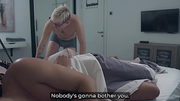 Step mom seduces step son in stormy bed share—husband watches creampie