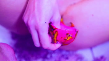 Bare toes crushing juicy fruit