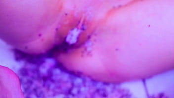 Bare toes crushing juicy fruit