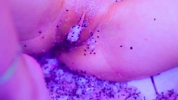 Bare toes crushing juicy fruit