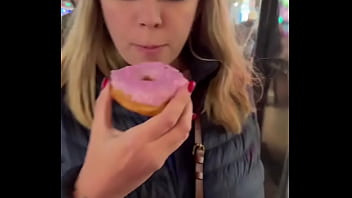 Licking the pink icing off this donut is a little