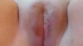 Shaved pussy being fingered close up