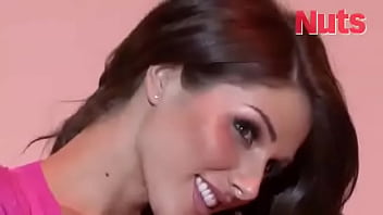 Busty brunette lucy pinder shows off her stunning cleavage for a photoshoot