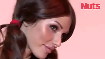 Busty brunette lucy pinder shows off her stunning cleavage for a photoshoot